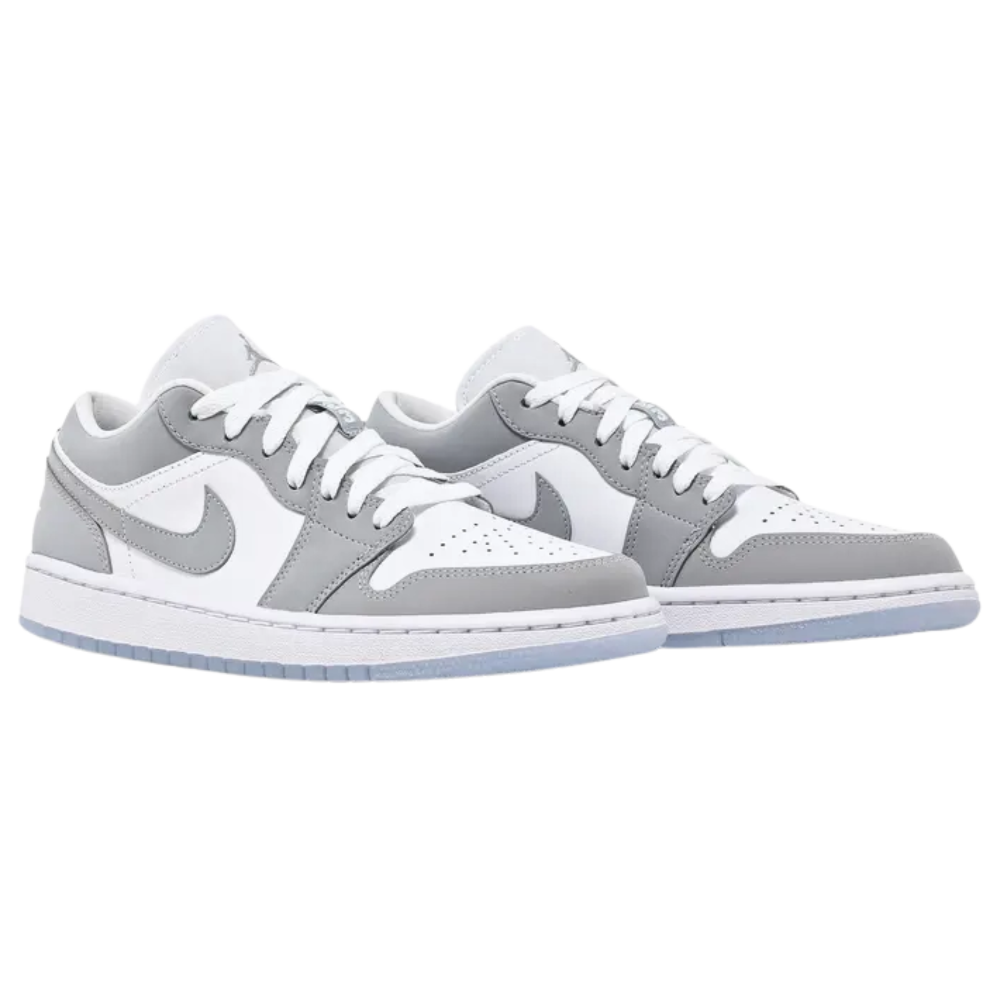 Wmns Air Jordan 1 Low 'White Wolf Grey' 2024 featuring a white leather upper with grey suede overlays and a grey Swoosh. The sneaker includes white laces, a woven Nike Air tongue tag, and a classic Wings logo on the heel tab. It sits on a white midsole with a grey rubber outsole.