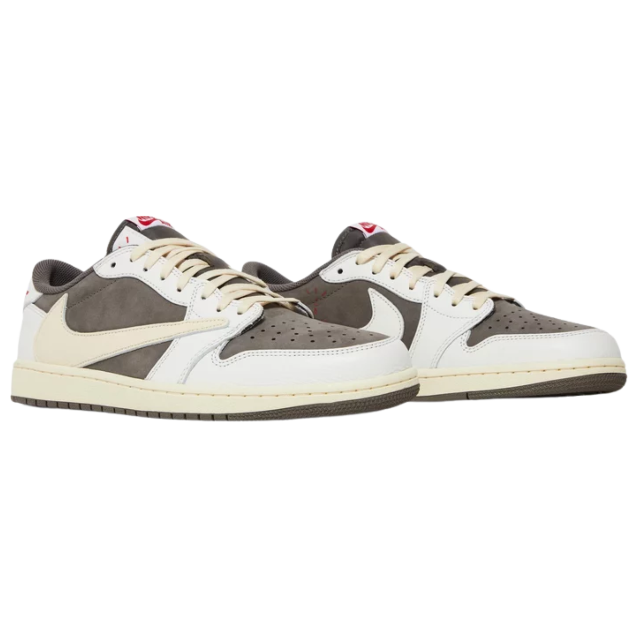 Travis Scott x Air Jordan 1 Retro Low OG ‘Reverse Mocha’ featuring a brown suede base with ivory leather overlays and a reverse Swoosh on the lateral side in oversized dimensions. The sneaker includes scarlet accents on the woven Nike Air tongue tags, mismatched Cactus Jack and retro Wings logos on the heel tabs, a vintage off-white rubber midsole with encapsulated Nike Air cushioning in the heel, and a brown rubber outsole.