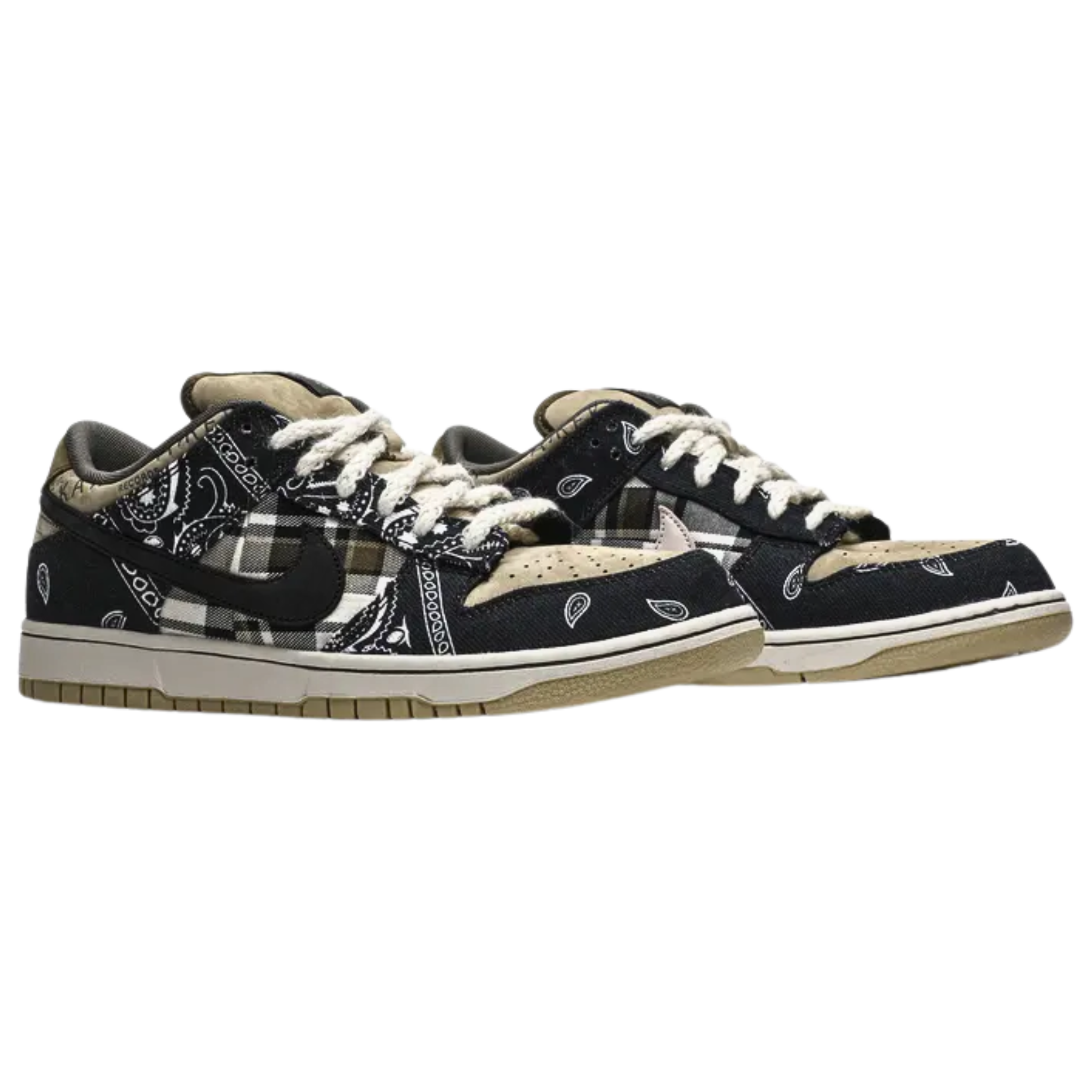 The Travis Scott x Nike Dunk Low SB features a unique patchwork design with a tan leather base, plaid quarter panels, and paisley print overlays that tear away to reveal hidden elephant print underneath. The contrasting patterns are paired with rope laces, Cactus Jack tongue tags, and mismatched black and pink Swooshes on each shoe. The sneaker is completed with a white midsole and a tan rubber outsole for a stylish and layered look.