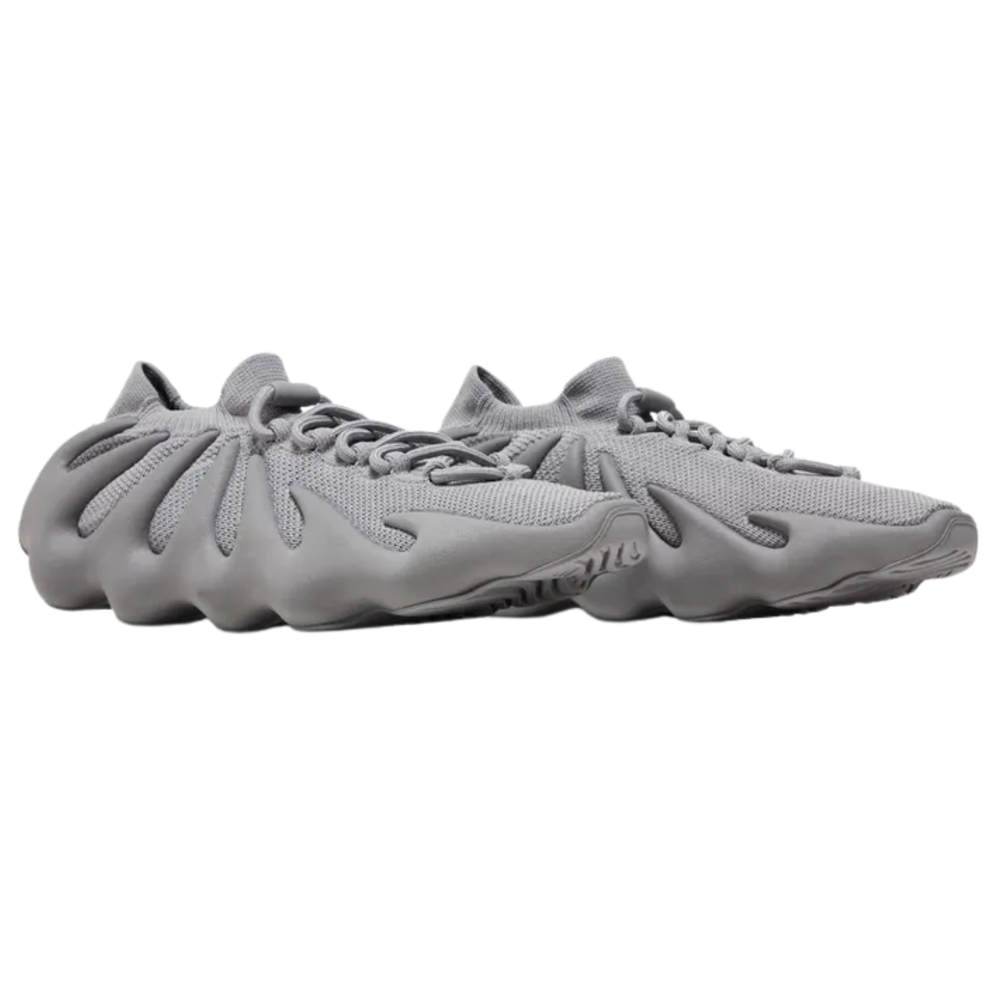 Shop the adidas Yeezy 450 ‘Stone Grey’ featuring a sleek grey one-piece knit upper with a sock-like collar and standard lace closure. The PU-injected midsole wraps up the sides for unique style and structural support, while the contoured rubber outsole offers a wavy traction pattern for optimal grip.