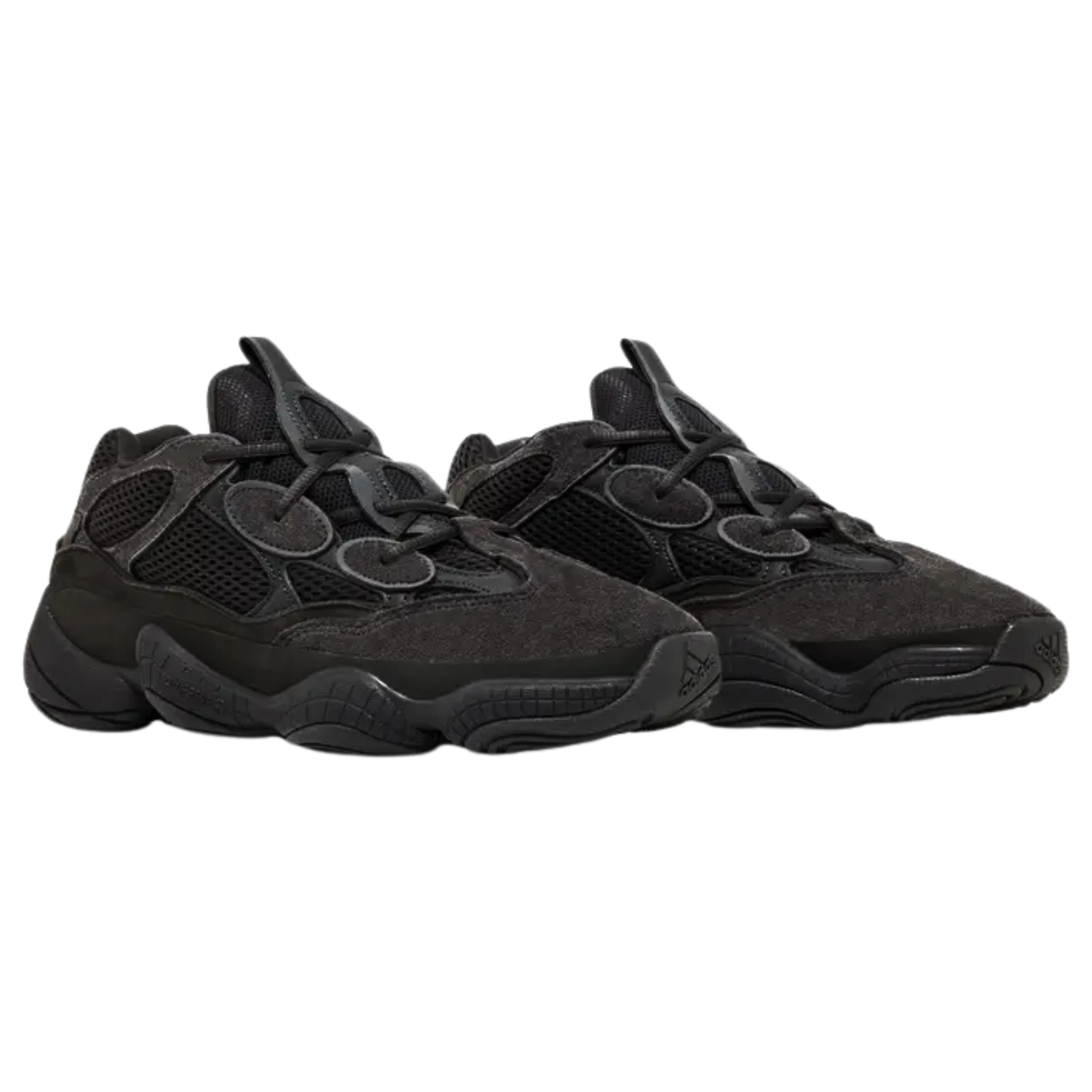 Shop the adidas Yeezy 500 ‘Utility Black,’ featuring a retro-inspired silhouette with a sleek, semi-faded black mesh and suede upper. The bulky design is contrasted by the unique use of tone, offering a softer black finish compared to the typical triple-black look. Released in July 2018, this colorway stands out with its minimalist, versatile style.