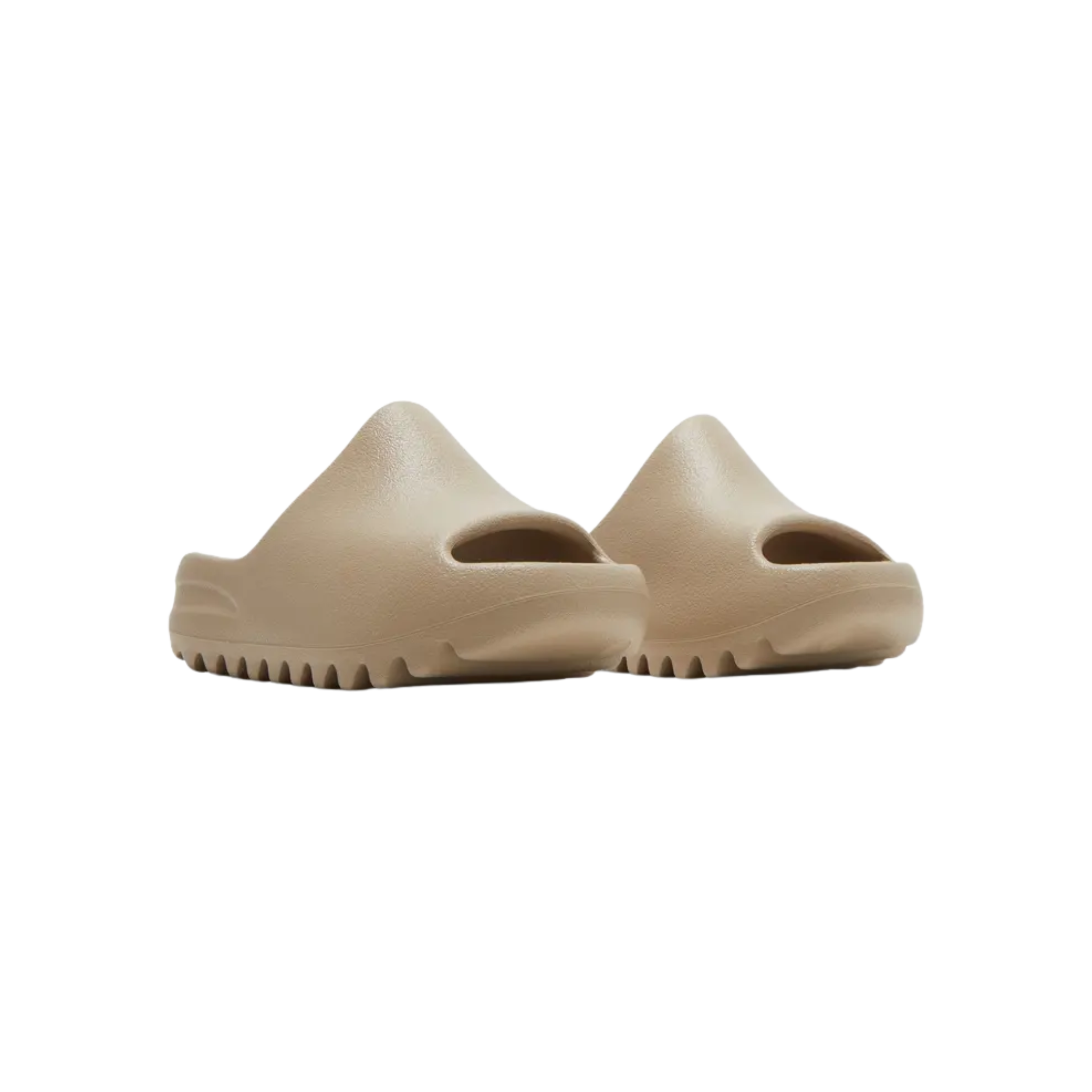 Discover the Yeezy Slides Kids 'Pure' 2022 re-release, featuring a minimalist design in a neutral beige hue. Crafted from lightweight and durable injected EVA foam, the one-piece slip-on ensures comfort with a soft footbed, while the textured outsole provides traction and stability for little feet.
