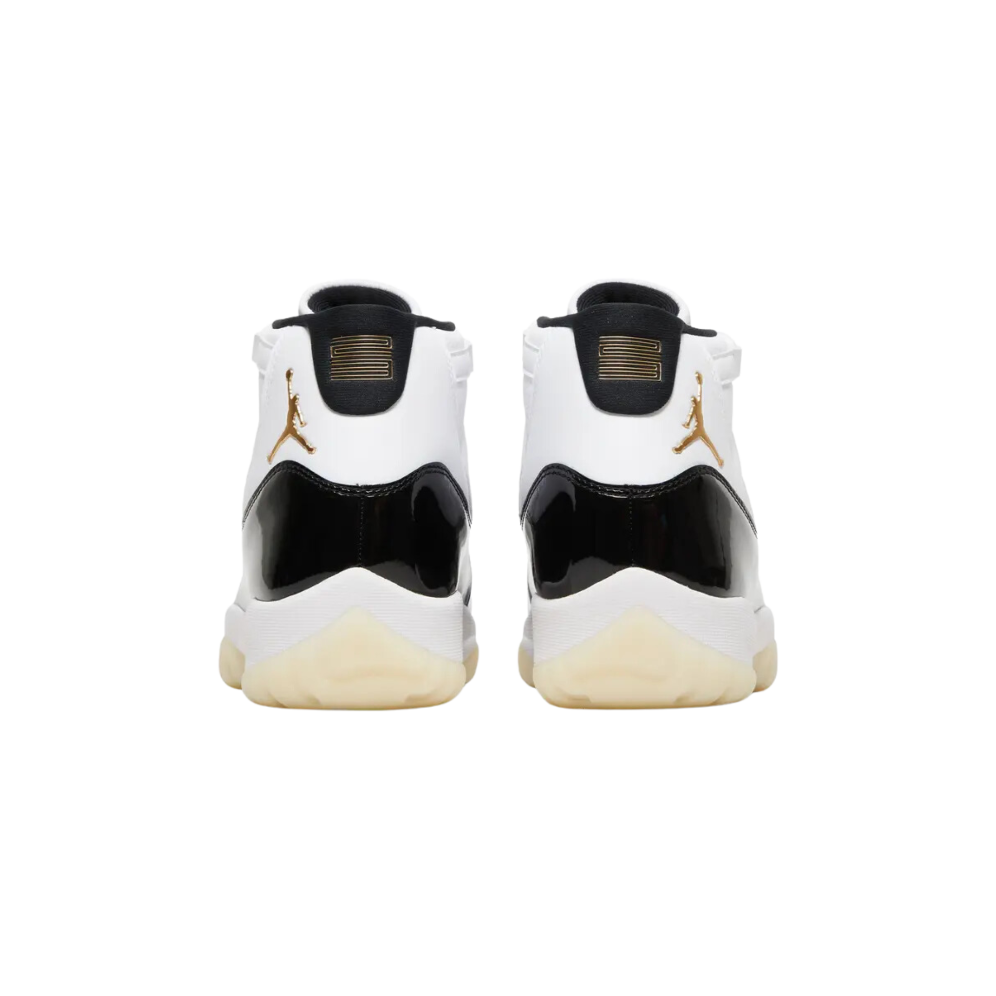 Air Jordan 11 Retro 'Gratitude / Defining Moments' (2023) featuring a white tumbled leather upper with tonal webbing eyelets and a black patent leather mudguard. The sneaker includes metallic gold accents on the embossed Jumpman logo on the lateral ankle, a '23' stamped on the heel tab, a Phylon midsole, a carbon fiber shank plate, and a translucent rubber outsole.