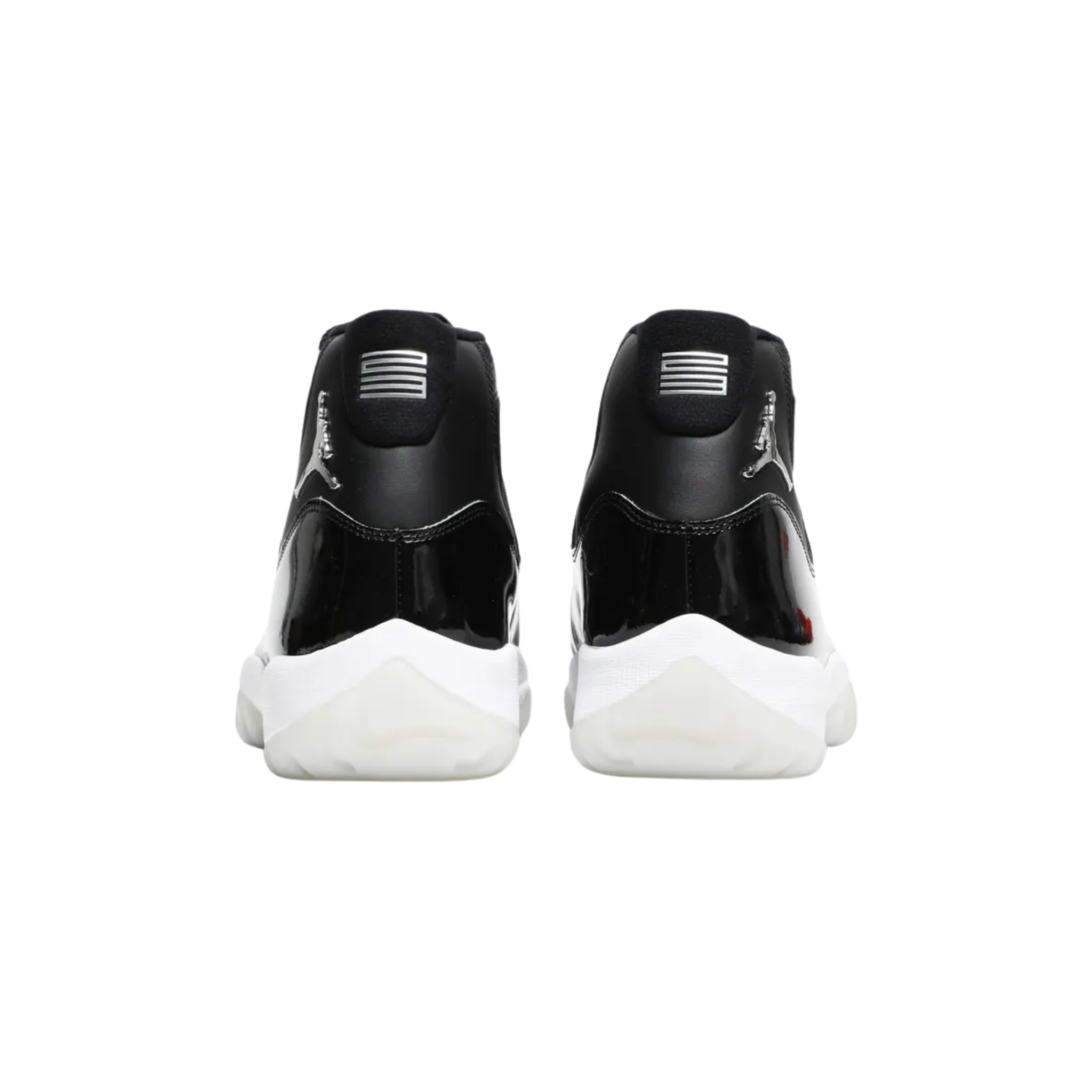 The Air Jordan 11 'Jubilee' celebrates the 25th anniversary with a black ballistic mesh and patent leather upper. A 3D metallic Jumpman and '23' branding adorn the heel, with 'Jordan' spelled out in silver lettering on the eyelets. The sneaker features a white foam midsole and translucent rubber outsole.