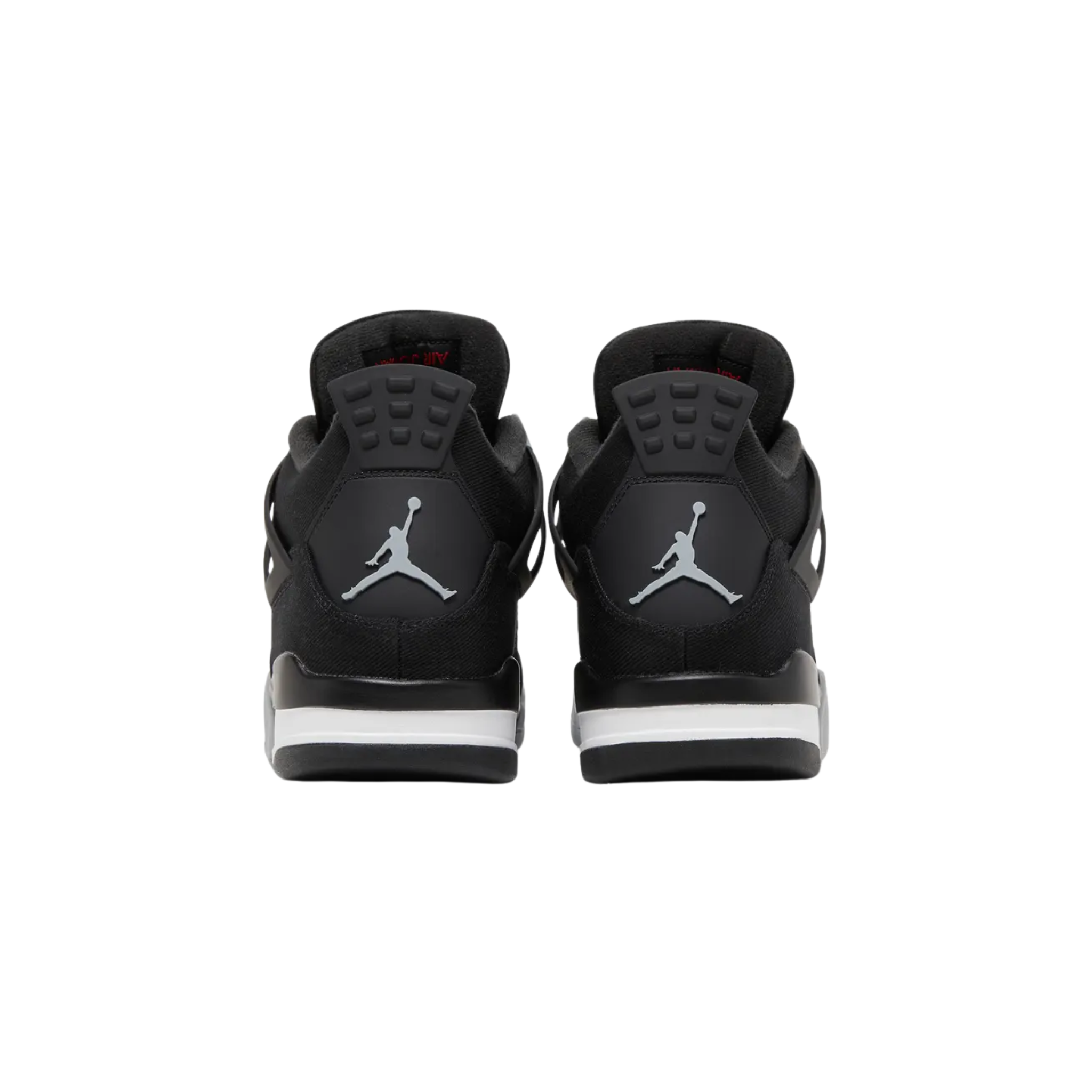 Air Jordan 4 Retro SE ‘Black Canvas’ featuring a black canvas upper with a tonal suede forefoot overlay and grey molded eyelets. The sneaker includes a matching grey Jumpman on the back heel and woven tongue tag, accented with a crimson Flight logo, and sits on a two-tone polyurethane midsole with visible Air-sole cushioning in the heel.
