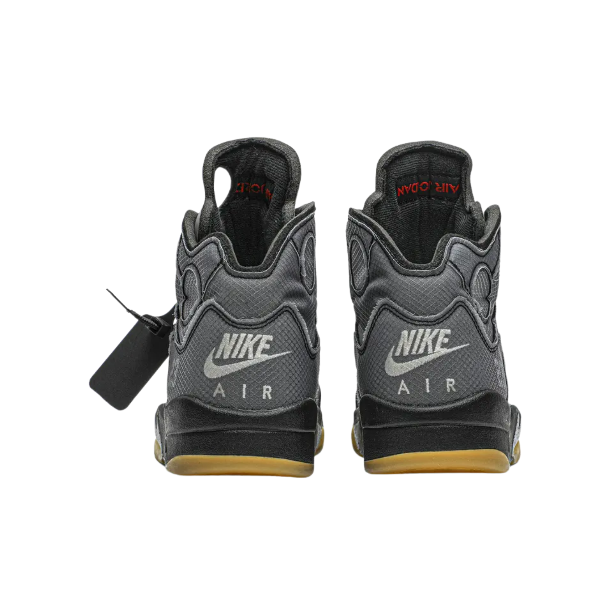 The Off-White x Air Jordan 5 SP 'Muslin' features a faded black textile upper with a silver reflective tongue and embroidered Nike Air branding. Virgil Abloh’s signature text appears on the laces and medial panel, while a pre-yellowed translucent rubber outsole enhances the vintage look.