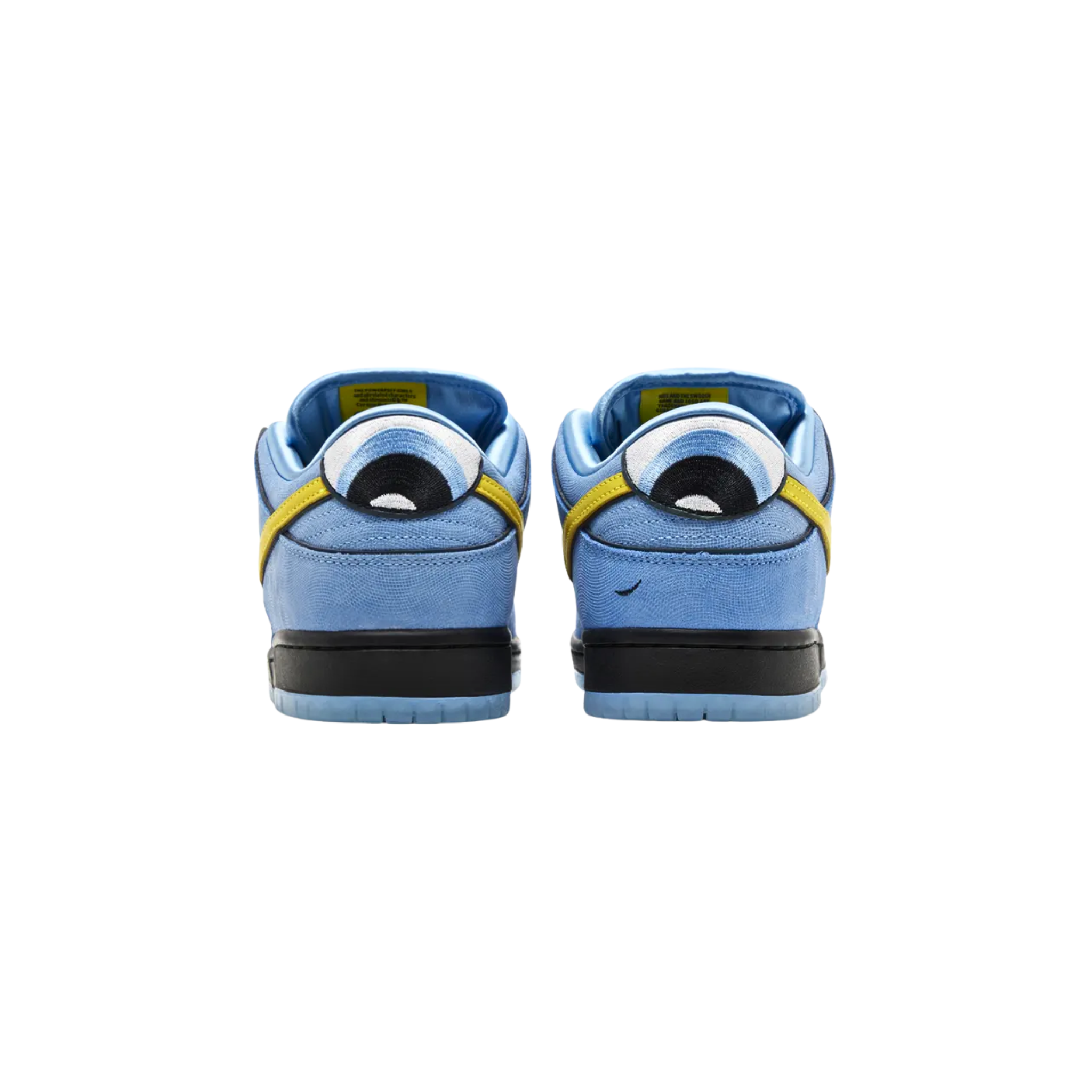 The Powerpuff Girls x Nike Dunk Low Pro SB QS ‘Bubbles’ features a textured blue leather upper with shiny satin lining, black piping, and a contrasting yellow Swoosh. Enlarged heel tabs reflect Bubbles' blue eyes, while the Powerpuff Girls logo appears on a repeating pattern on the stuffed tongue. The sneaker is supported by a durable black midsole and a blue-tinged translucent rubber outsole, combining playful design with functionality.