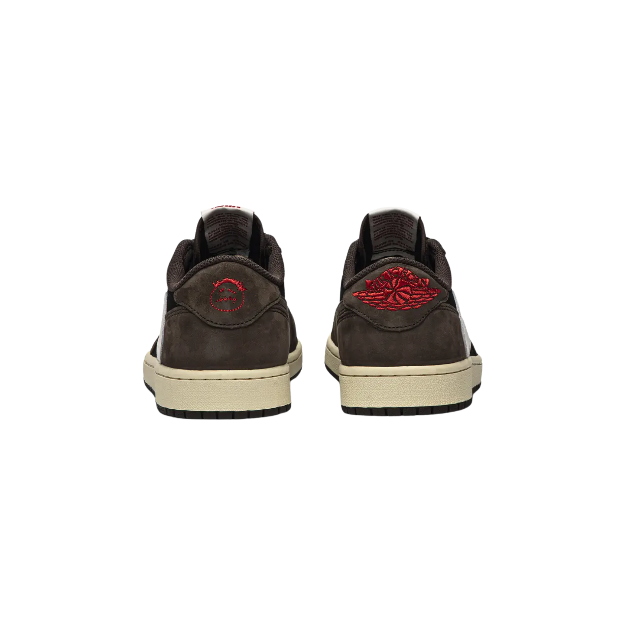 The Travis Scott x Air Jordan 1 Low features a black and Dark Mocha nubuck upper with University Red accents. The shoe showcases an oversized backward-facing Swoosh on the lateral side, a standard Swoosh on the medial side, and subtle 'Cactus Jack' branding on the tongue, panel, and sockliner. The back heel tabs feature stitched logos: Air Jordan Wings on the right and Scott’s face on the left.