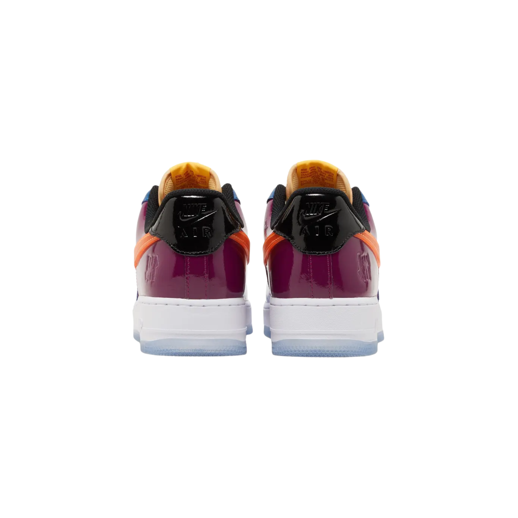 The Undefeated x Nike Air Force 1 Low ‘Total Orange’ features a glossy patent leather upper with a bold mix of blue, fuchsia, crimson, purple, and black. The shoe includes a stitched orange Swoosh, UNDFTD lace dubrae, and a debossed Nike Air logo on the heel tab. Undefeated's Five Strikes graphic appears on the lateral heel and woven tongue tag. The sneaker is set on a white midsole with encapsulated Air-sole cushioning and a translucent rubber outsole for a stylish, comfortable finish.