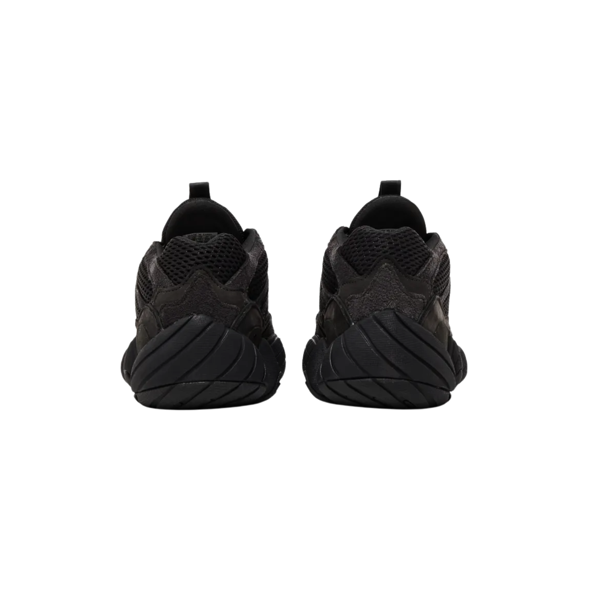 Shop the adidas Yeezy 500 ‘Utility Black,’ featuring a retro-inspired silhouette with a sleek, semi-faded black mesh and suede upper. The bulky design is contrasted by the unique use of tone, offering a softer black finish compared to the typical triple-black look. Released in July 2018, this colorway stands out with its minimalist, versatile style.