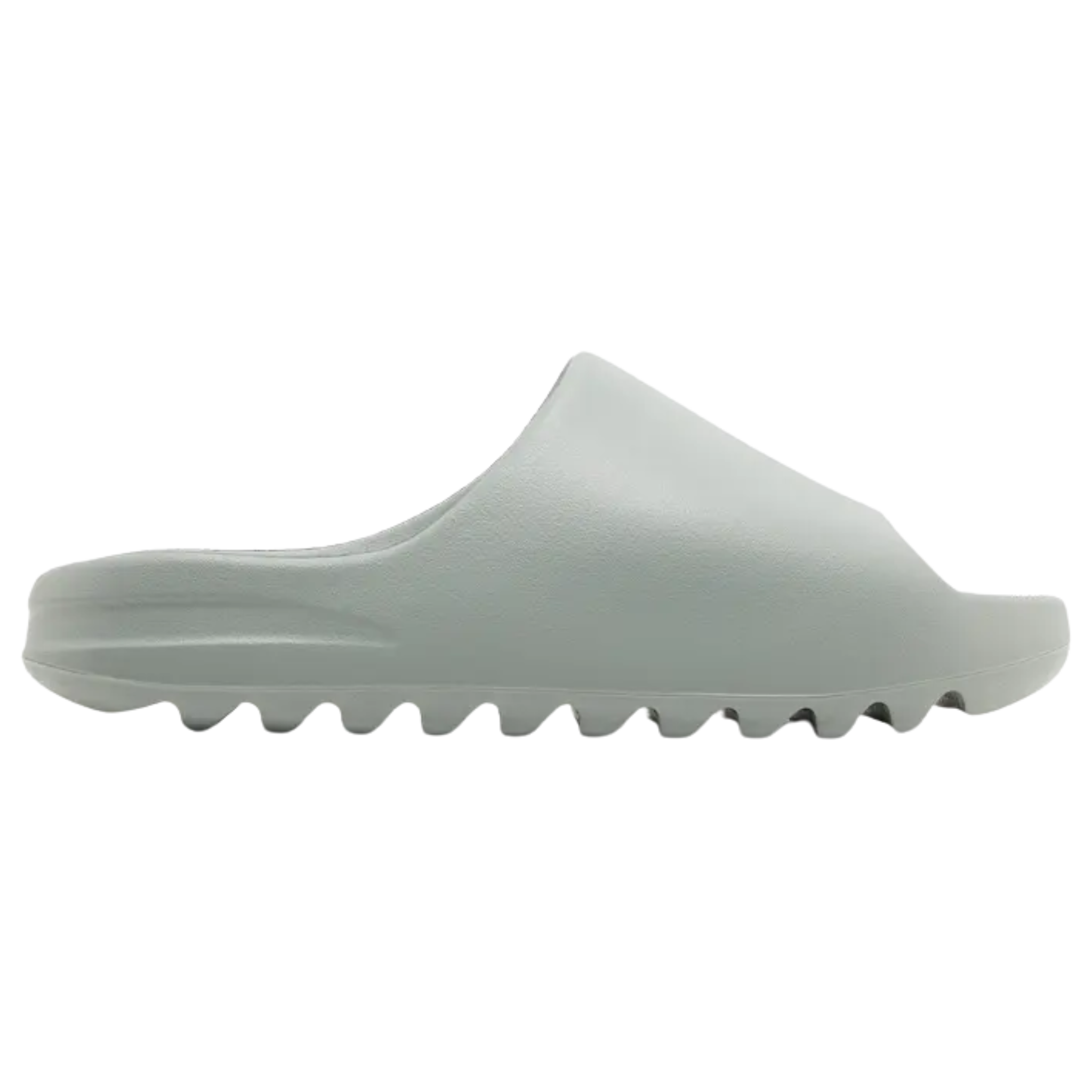 Shop the adidas Yeezy Slide ‘Salt’ in a monochromatic grey, crafted from lightweight injected EVA foam. With a soft footbed for comfort, open-toe construction for airflow, and a serrated outsole with deep grooves for enhanced cushioning and grip.