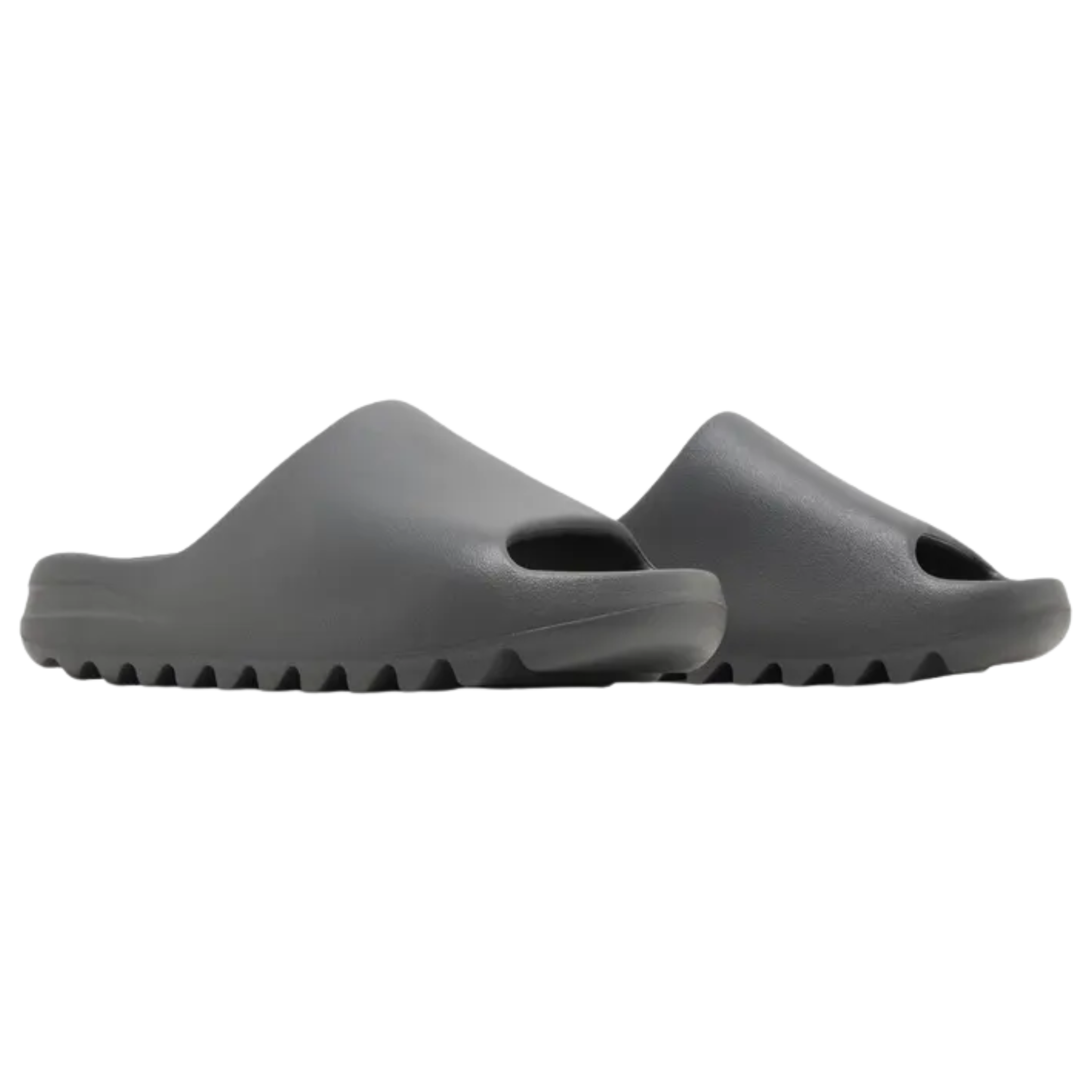 Shop the adidas Yeezy Slide ‘Granite’ in a sleek dark grey, crafted from lightweight EVA foam for a comfortable fit. Featuring a wide strap upper, soft footbed with the adidas three-stripe logo, and a strategically grooved outsole for enhanced traction and a smooth ride.