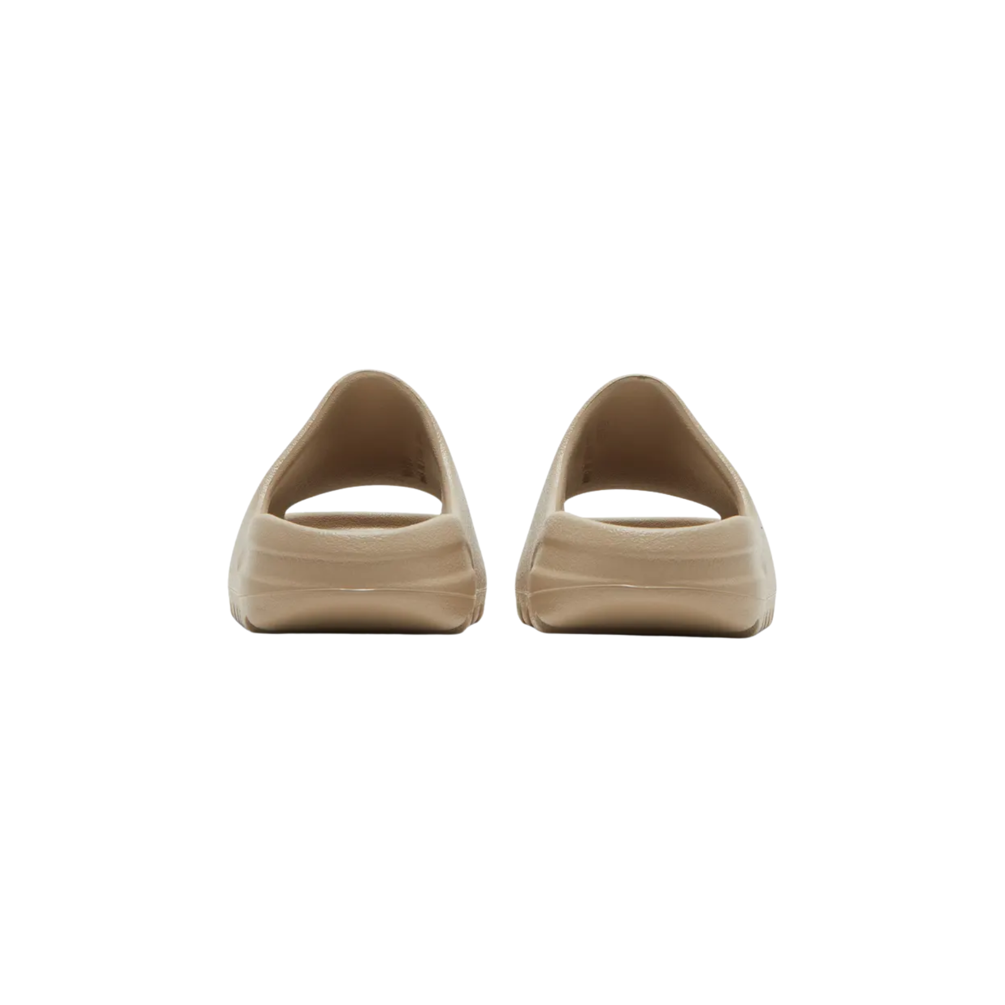 Discover the Yeezy Slides Kids 'Pure' 2022 re-release, featuring a minimalist design in a neutral beige hue. Crafted from lightweight and durable injected EVA foam, the one-piece slip-on ensures comfort with a soft footbed, while the textured outsole provides traction and stability for little feet.