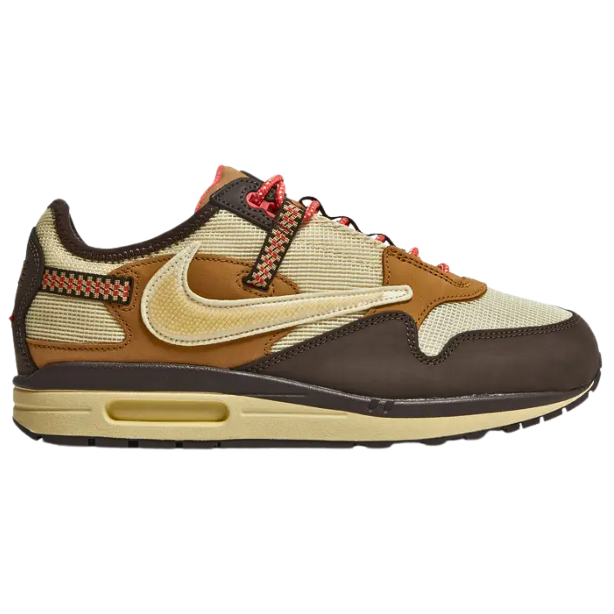 The Travis Scott x Nike Air Max 1 ‘Baroque Brown’ features a rugged outdoor-inspired design with a cream mesh upper, dark tan leather overlays, and a brown nubuck mudguard. Red hiker-style laces secure the shoe, with a reverse Lemon Drop Swoosh on the lateral panel. Multicolor woven straps are integrated into the laces and heel overlay, which sports a crimson patch with Cactus Jack branding on the right shoe and a Nike logo on the left. 