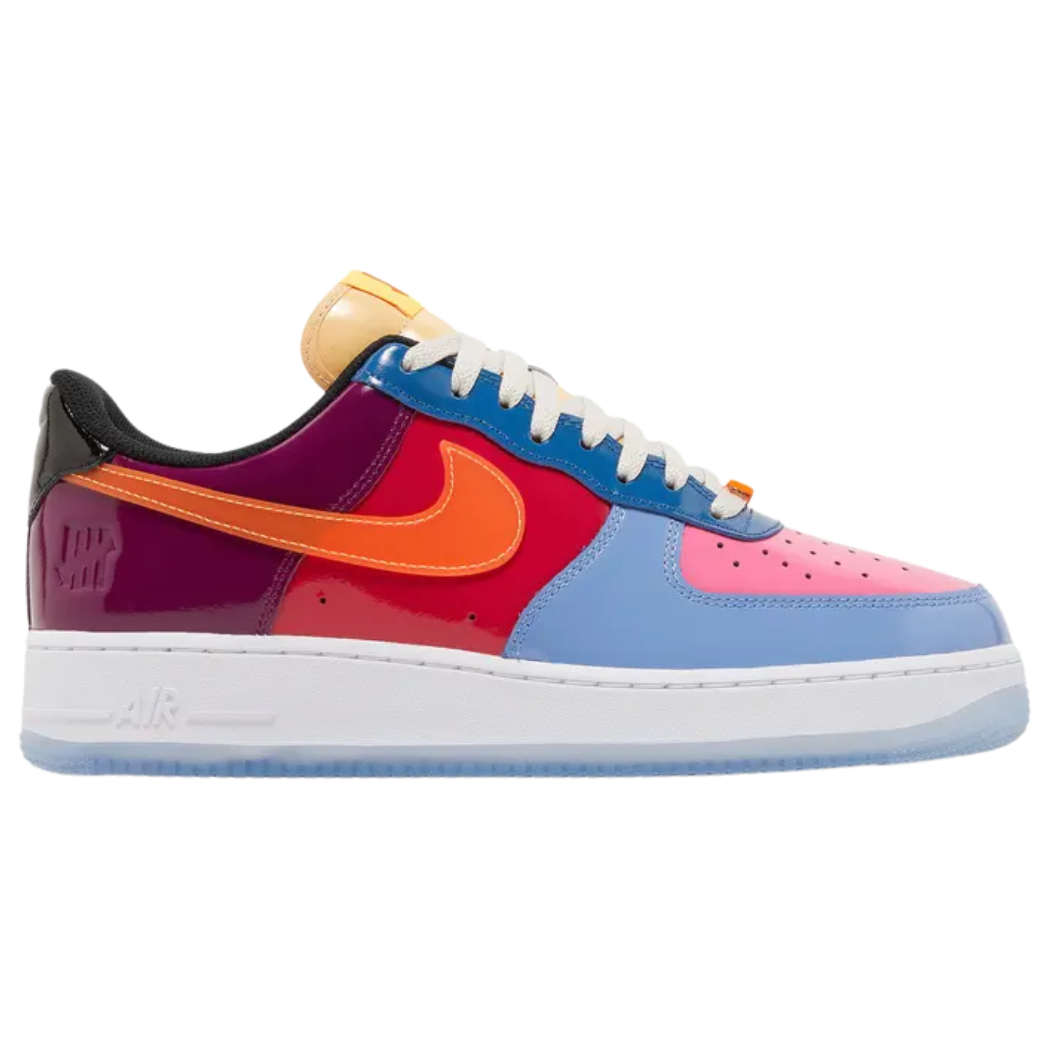 The Undefeated x Nike Air Force 1 Low ‘Total Orange’ features a glossy patent leather upper with a bold mix of blue, fuchsia, crimson, purple, and black. The shoe includes a stitched orange Swoosh, UNDFTD lace dubrae, and a debossed Nike Air logo on the heel tab. Undefeated's Five Strikes graphic appears on the lateral heel and woven tongue tag. The sneaker is set on a white midsole with encapsulated Air-sole cushioning and a translucent rubber outsole for a stylish, comfortable finish.